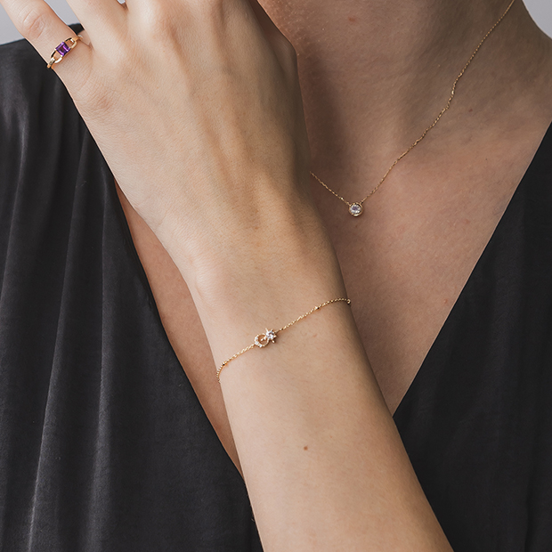 CROSSING STAR & MOON BRACELET